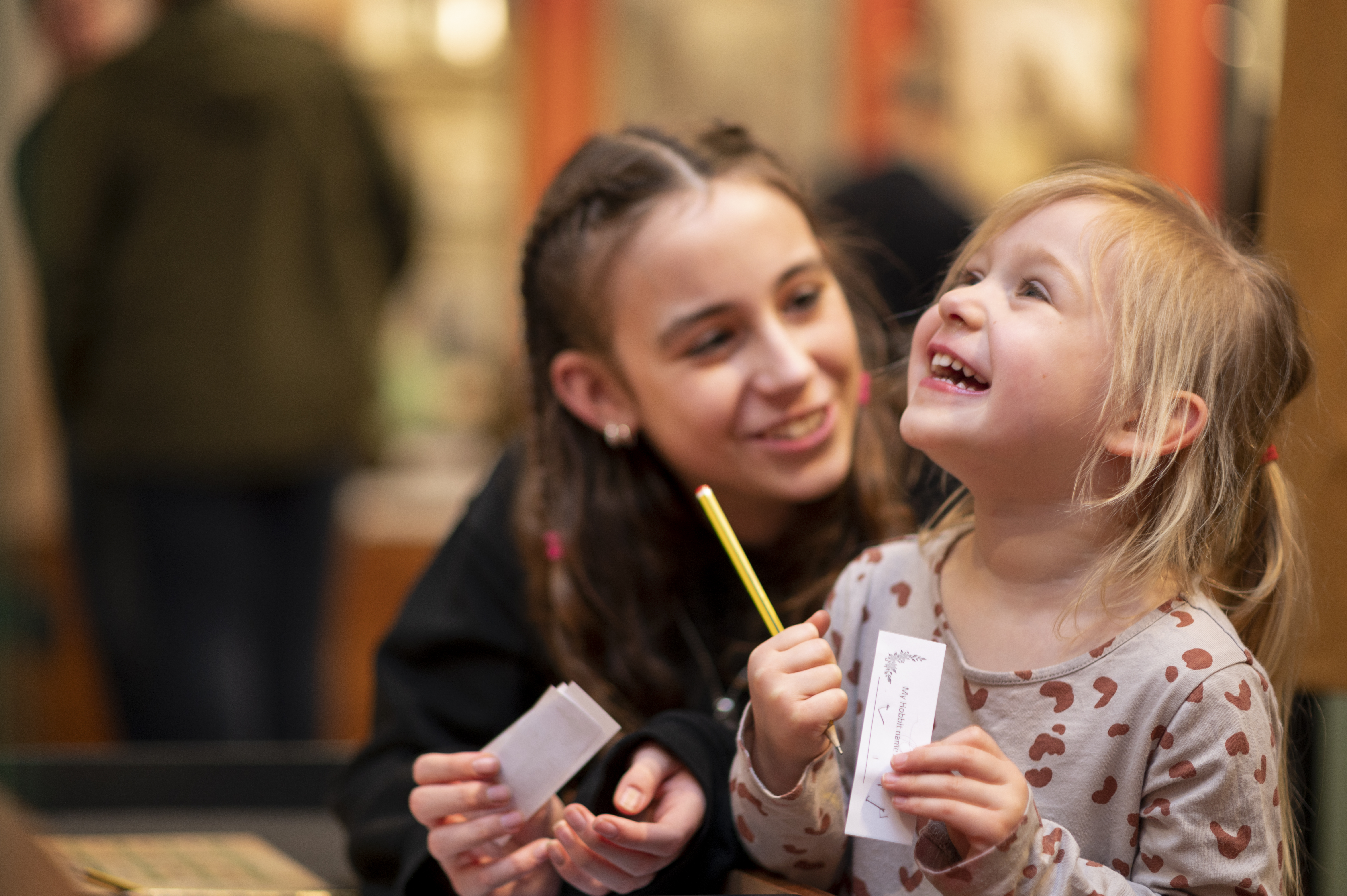 A child laughs at the Novium's summer exhibition 