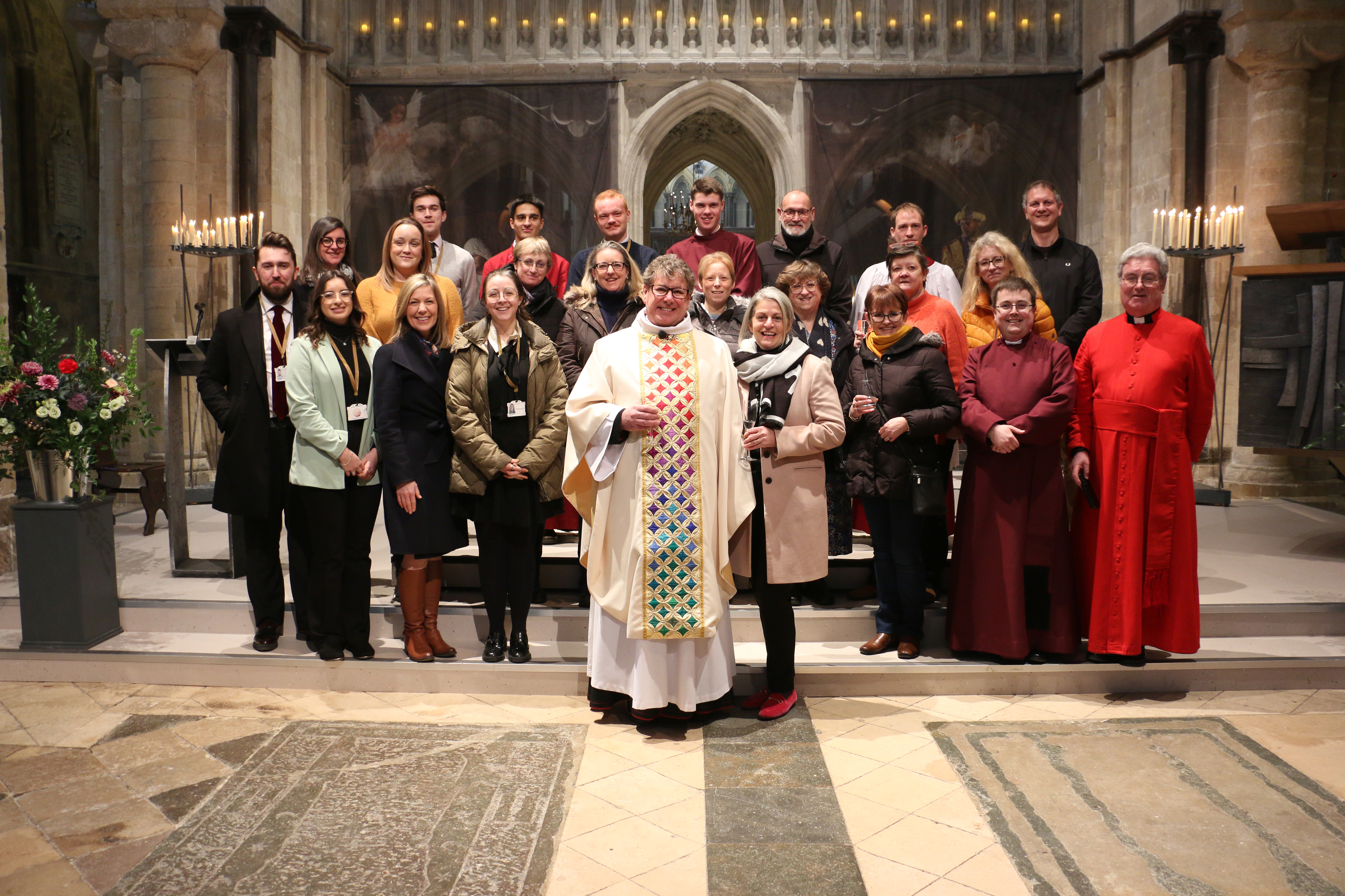 Cathedral staff team stand in the Cathedral Nave with the Very Reverend Stephen Waine and his wife Lizzie 