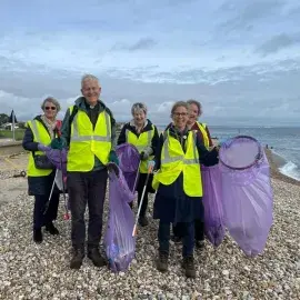 Cathedral staff and volunteers litter pick at Selsey beach