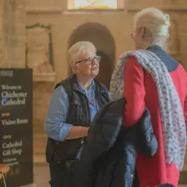 Cathedral Guide assisting a visitor