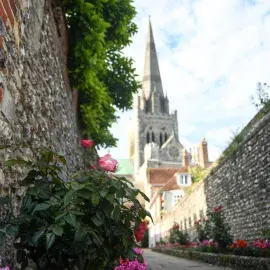 Cathedral seen from St Richards walk - with pink flowers on the borders