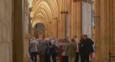 A large group of people congregating in the Cathedral