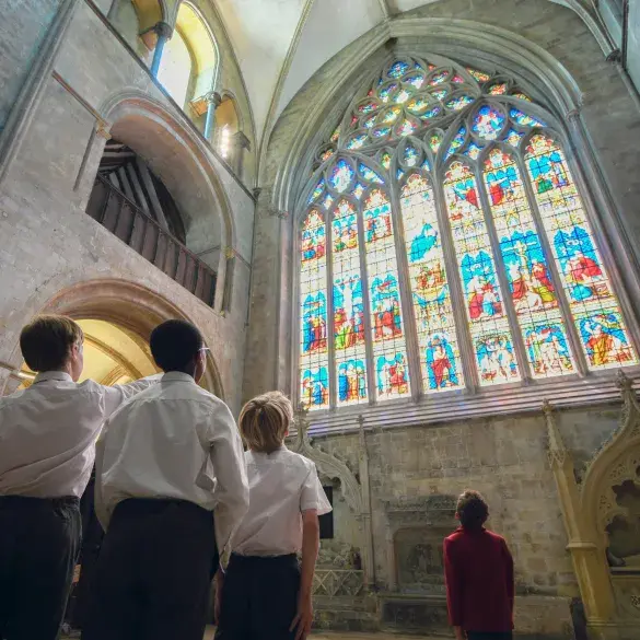 Children look at Stained glass windows