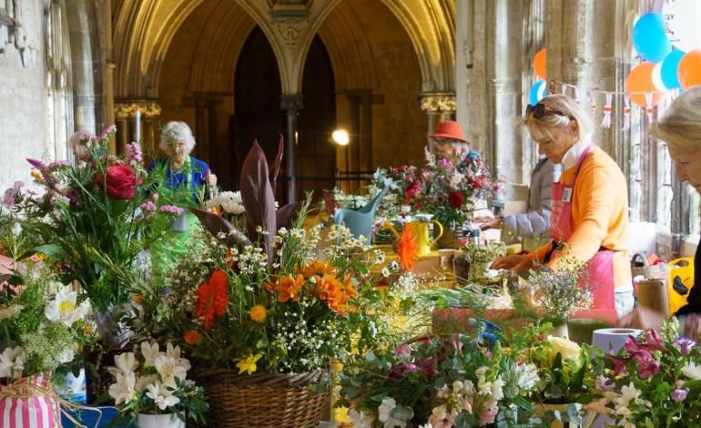 women and flower arrangements