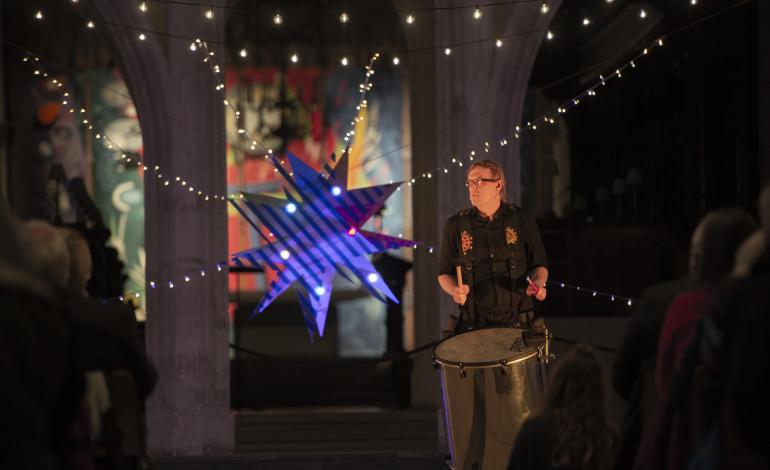 a drumming routine on African and Brazilian drums