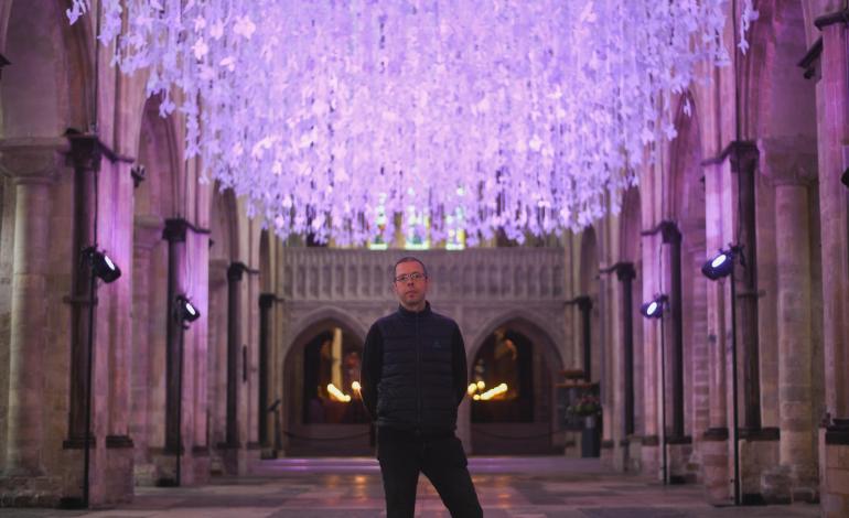 Peter Walker sculptor infront of Peace Doves