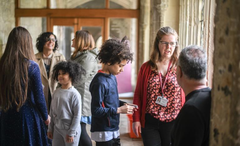 Volunteers help at the families service