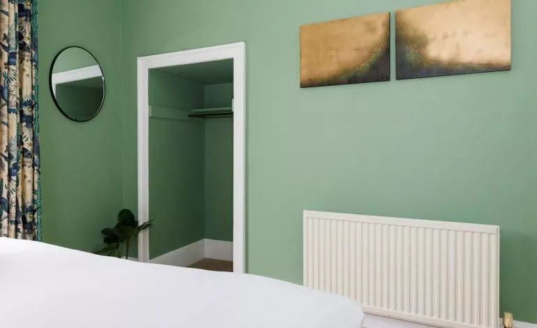 View of storage and artwork on the wall.