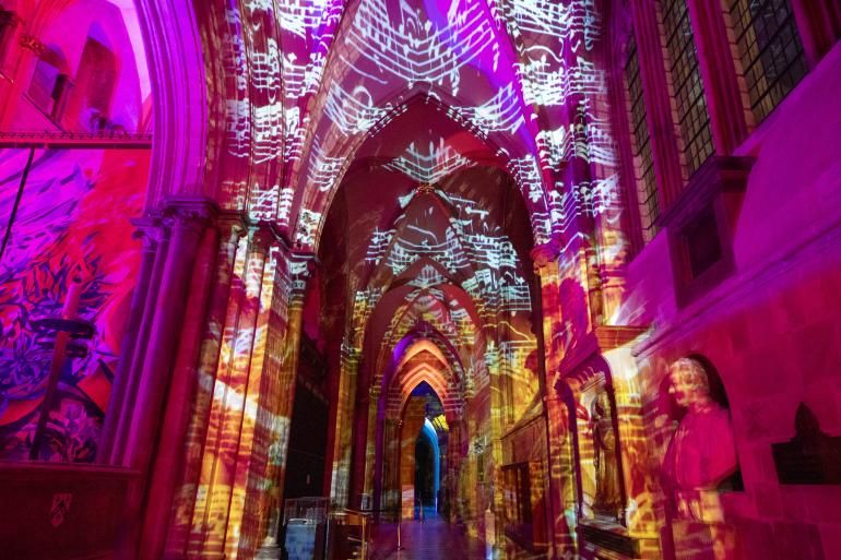 The North aisle in Chichester cathedral during the Chichester Light Experience, Illuminating Art